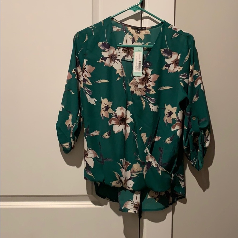 West Kei roll tab high low blouse